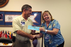 Photo of Dr. Lori Forman being congratulated.