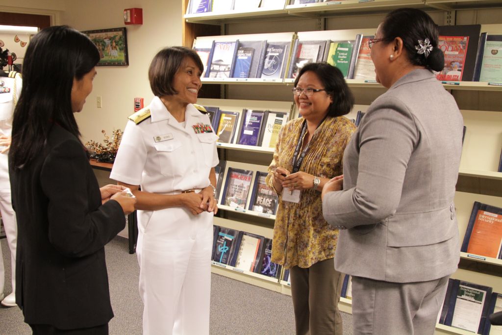 RDML Bono chats with ASC 12-2 Fellows in the APCSS Library during a visit to APCSS.