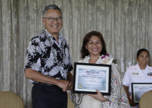 Doris Dyogi is recognized with an Exceptional Community Service Award photo.