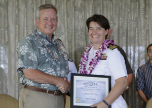 Lt. Cmdr. Robin Taylor receives her Team Excellence award photo