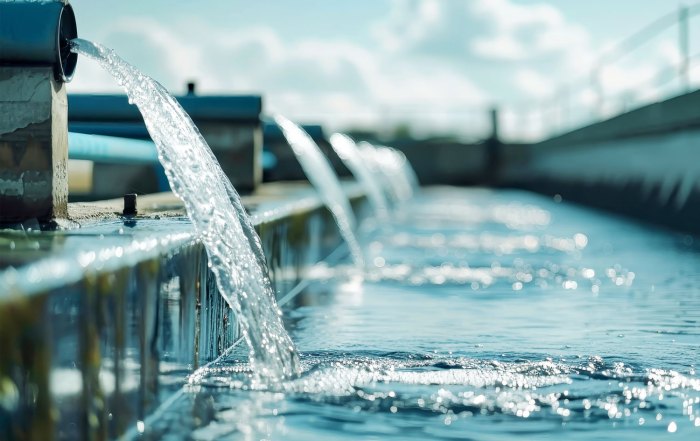 pipes with water coming out representing the title